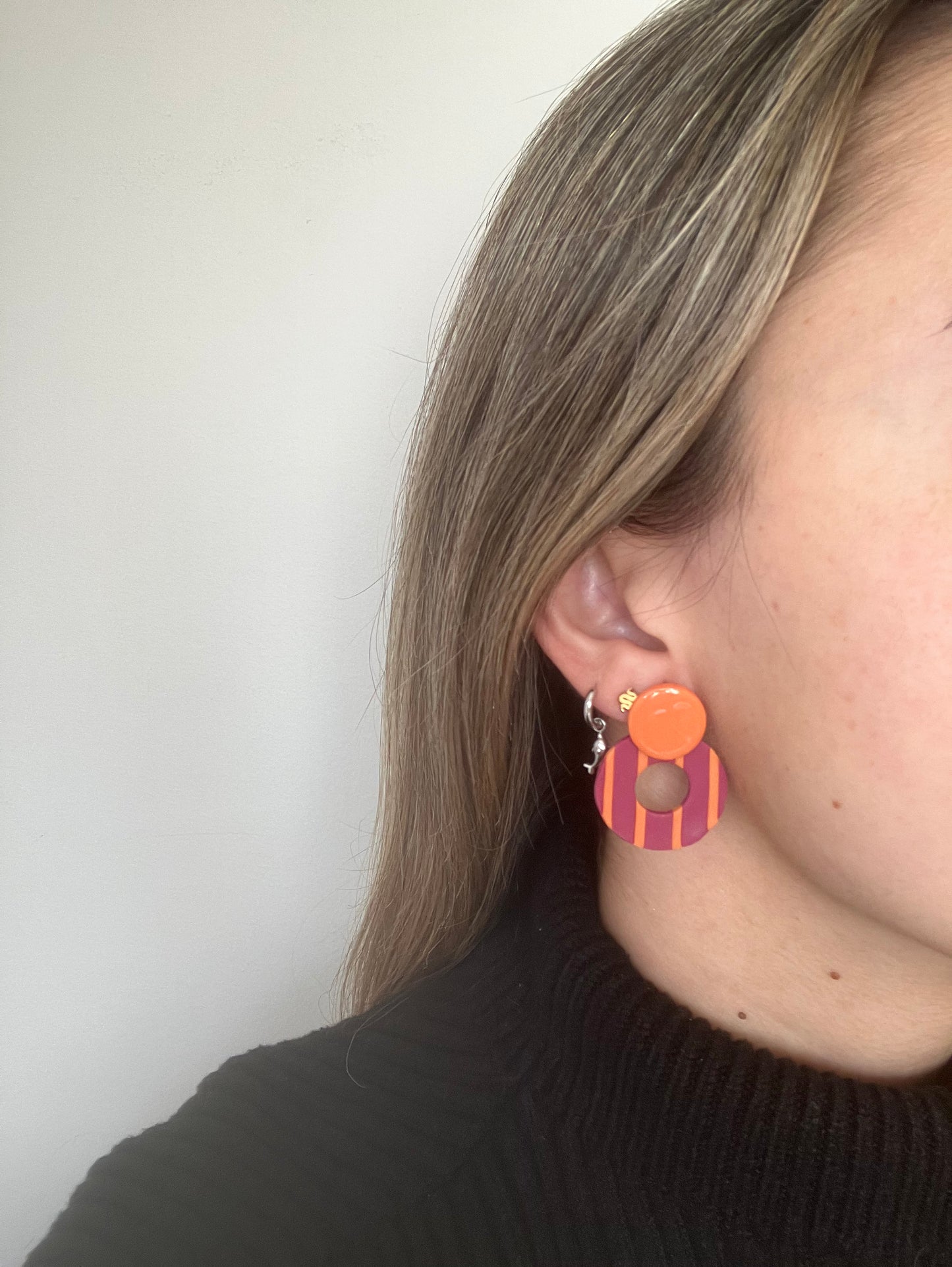 RINCA líneas rosa y naranja