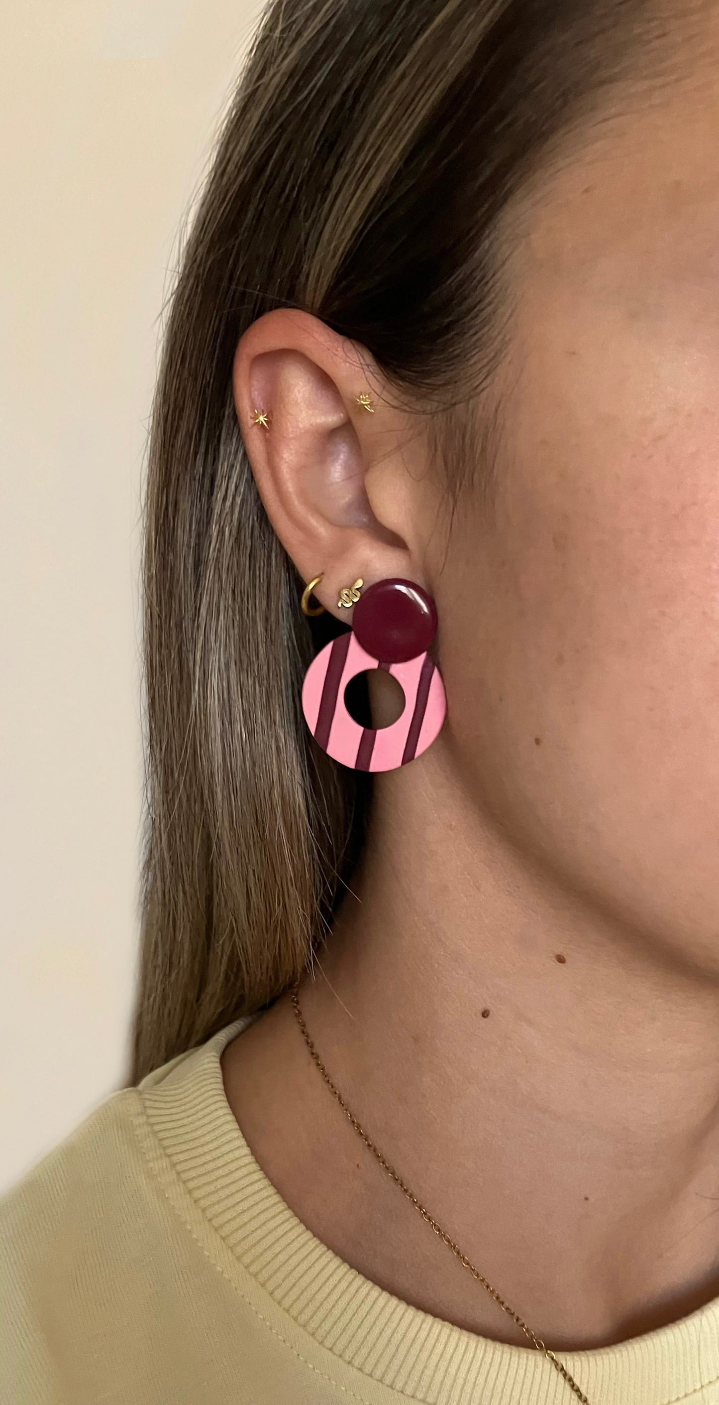 RINCA líneas rosa y burdeos