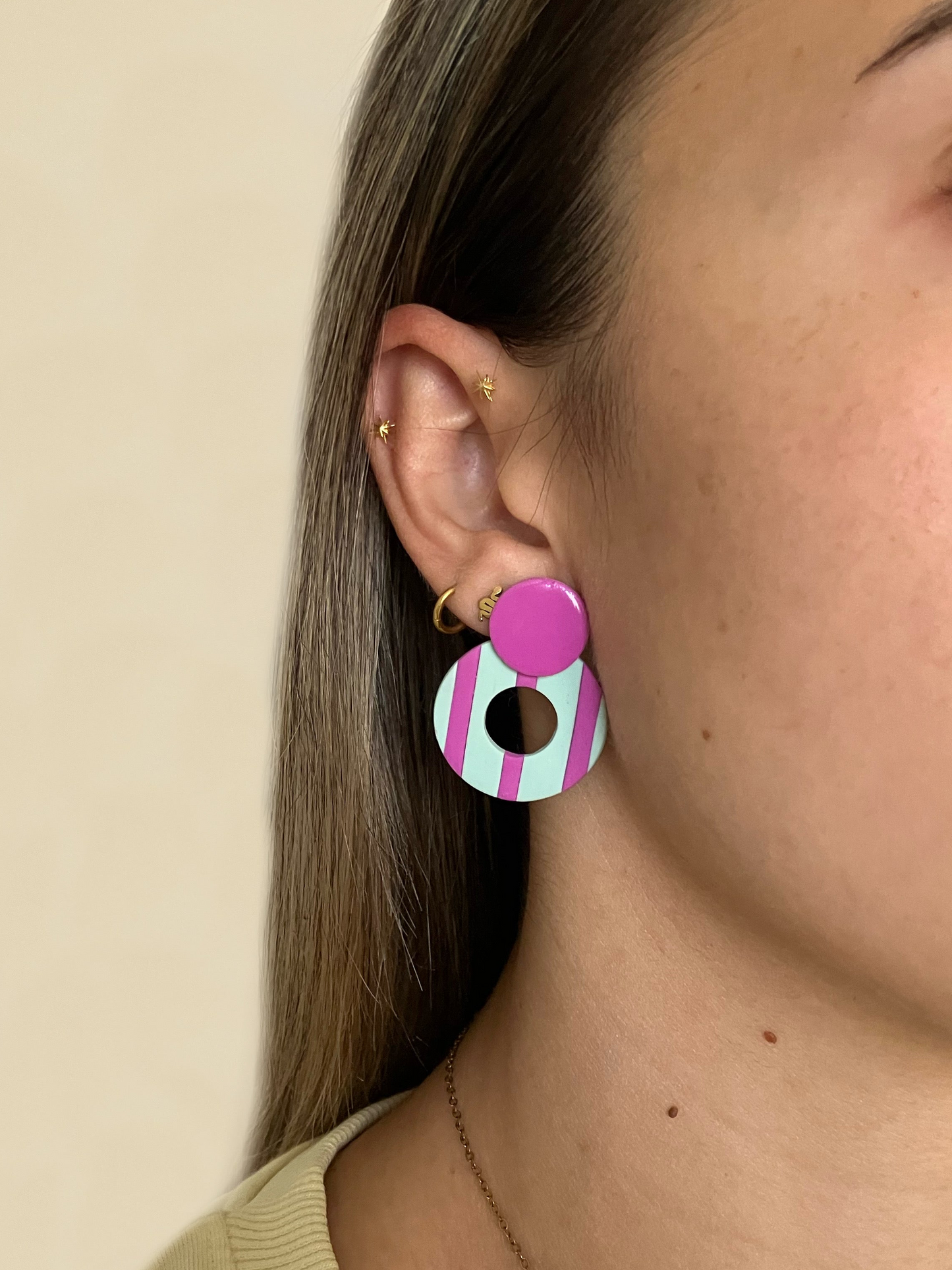 RINCA líneas turquesa y fucsia