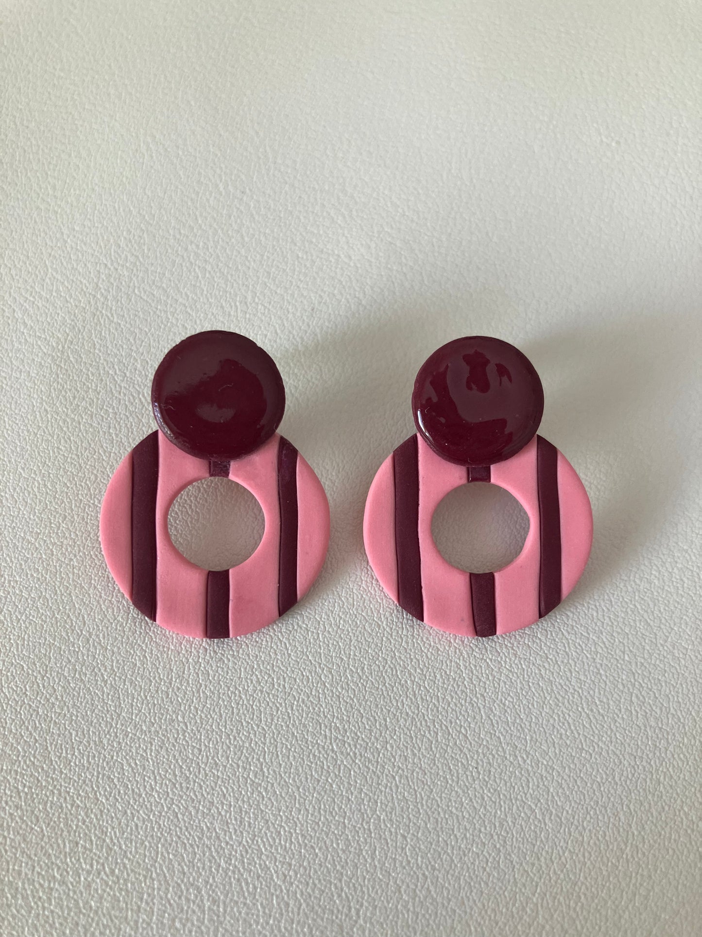 RINCA líneas rosa y burdeos