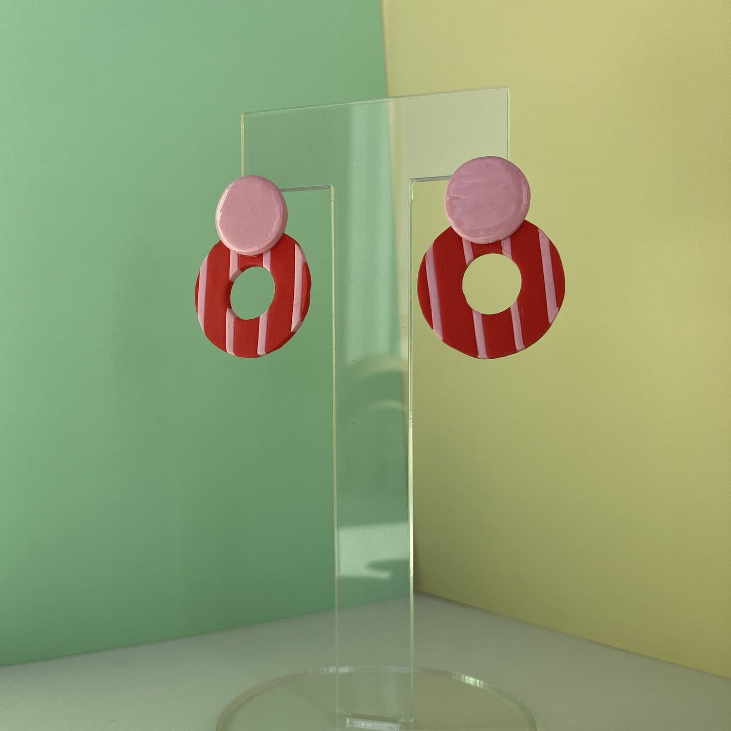 RINCA líneas rojo y rosa